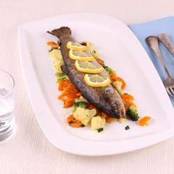 RestaurantDemo/menisto_44066935-Grilled-whole-trout-with-vegetables-and-cutlery.jpg